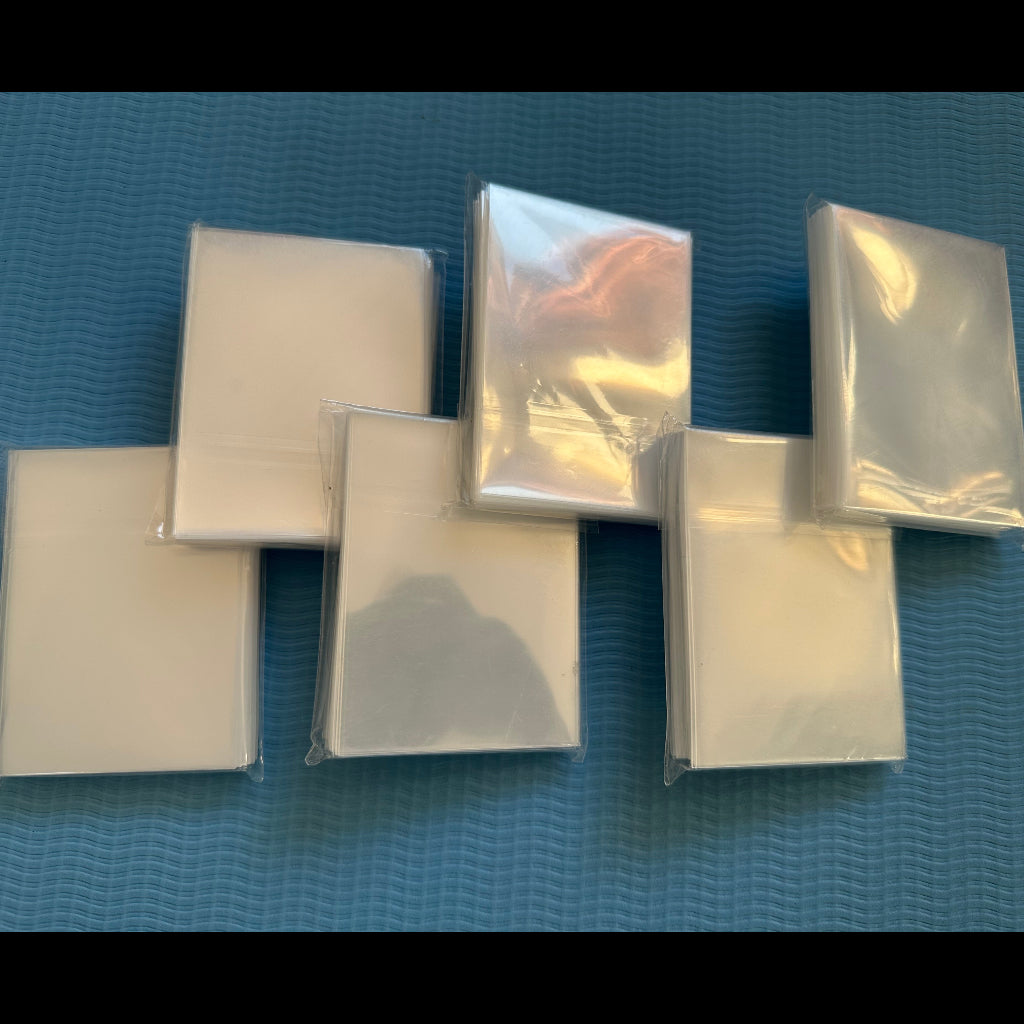 White Transparent Silk Card Sleeves – Standard Size 66×99mm | 100 Sleeves per Pack